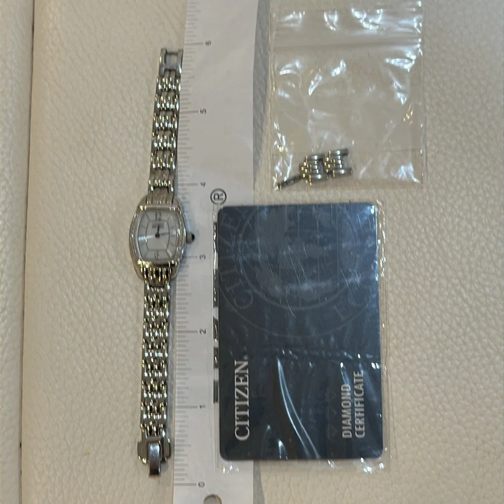 Citizen Women’s Natural Diamond Rectangle Wristwatch Model code: EW5413-50A